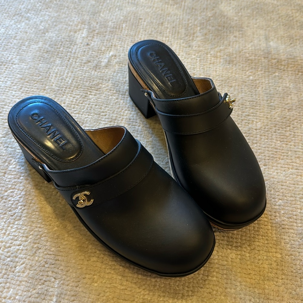 Chanel black leather turnlock clog mules